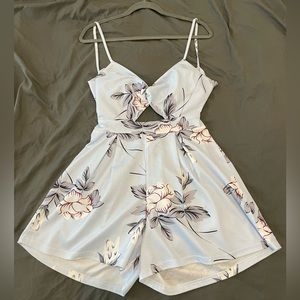 NWOT Blue Floral Twist Front Romper Shorts with Cut Out and Adjustable Tie Back